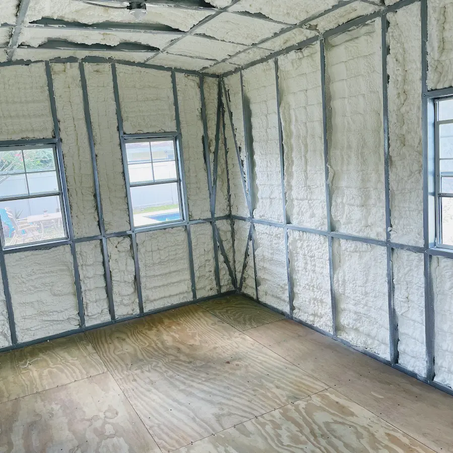 Closed-cell spray foam insulation applied to wall cavities in a residential project in Yankton